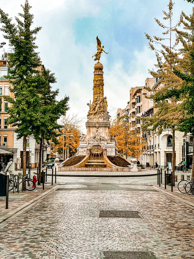 statue in centre square of Reims