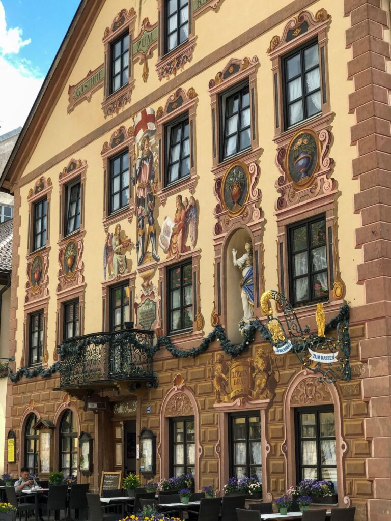 wall fresco on buildings in garmisch a stop along the german alpine road
