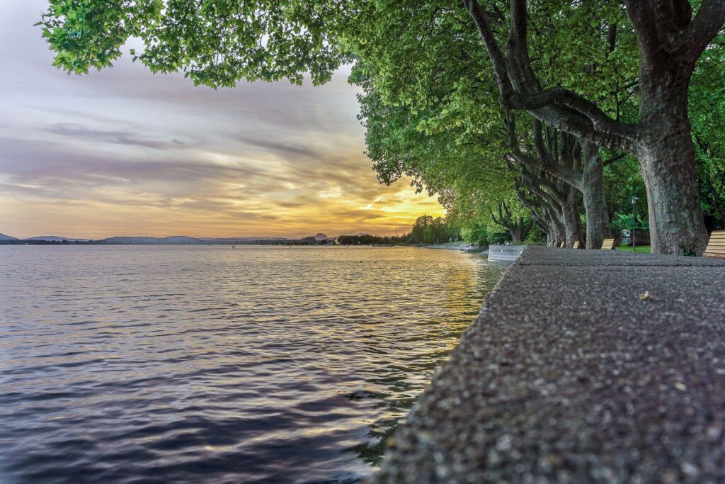 walking on the promenade of lake constance at sunrise is on of the best things to do in lake constance