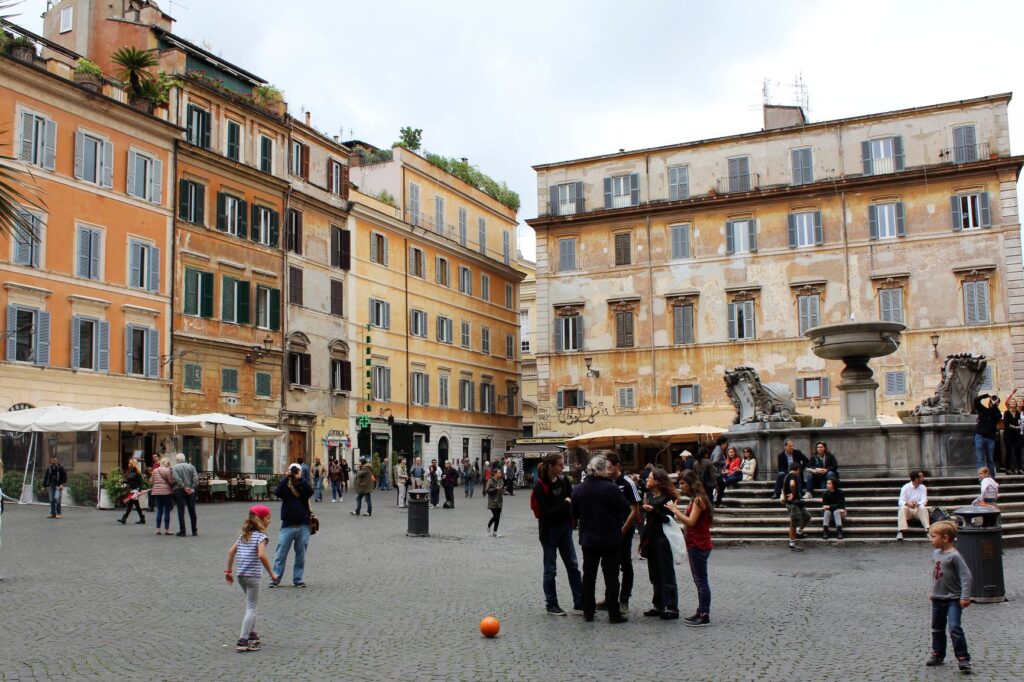 piazza in rome with people 