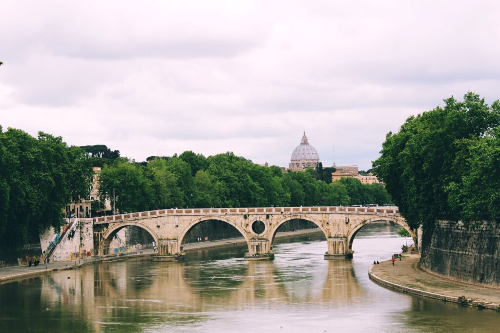 river with bridge in rome