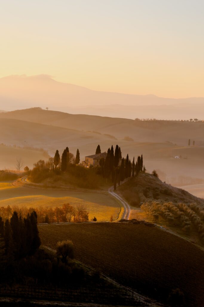 sunset over hills in tuscany
