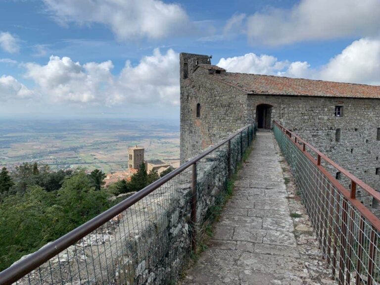 Perched on top of a hill, Cortona is an ancient walled town with lively piazzas, endless winding alleyways and many churches. Cortona lies in the Chiana valley of southern Tuscany in Italy