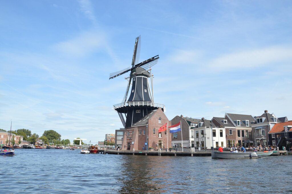 windmill with canal on day trip from amsterdam to haarlem