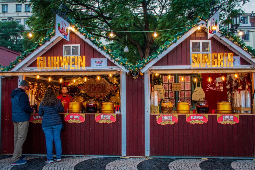 christmas market in lisbon with food stall