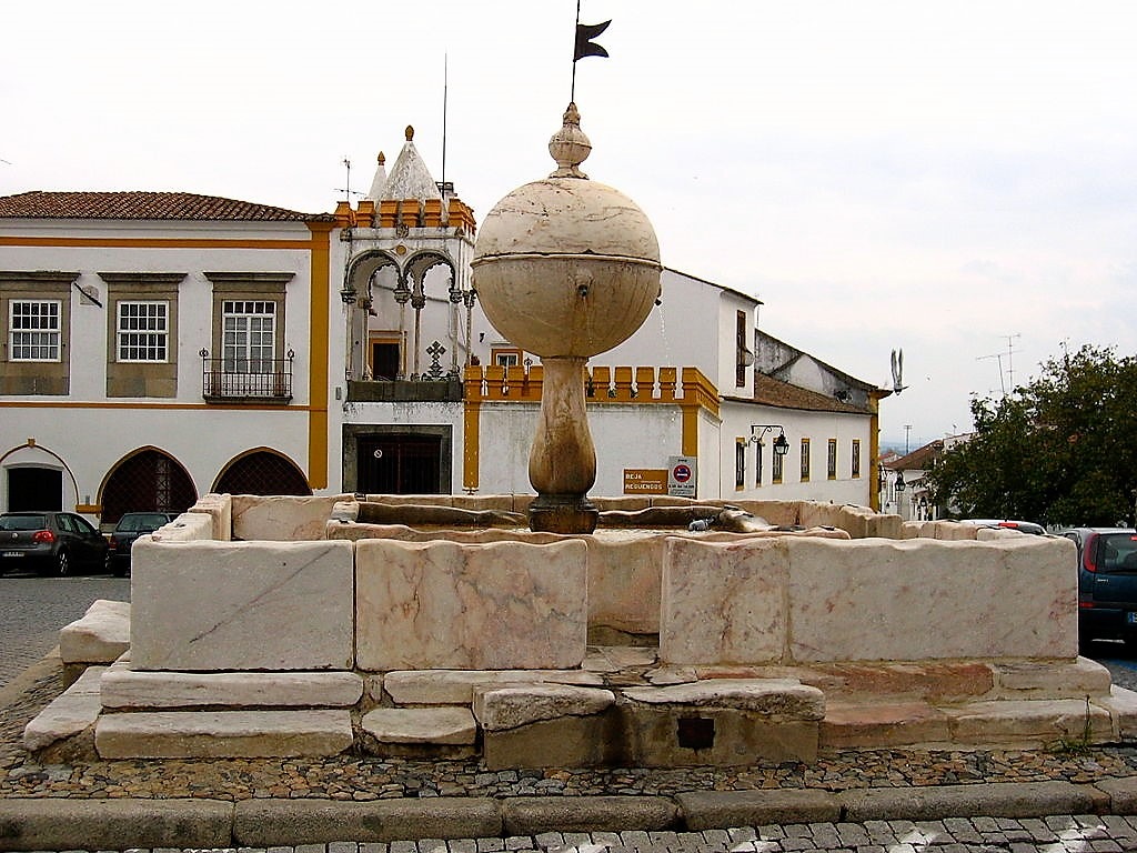 Fountain with globe in one day in evora