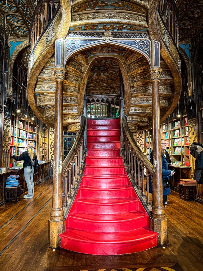 red staircase in bookshop in porto