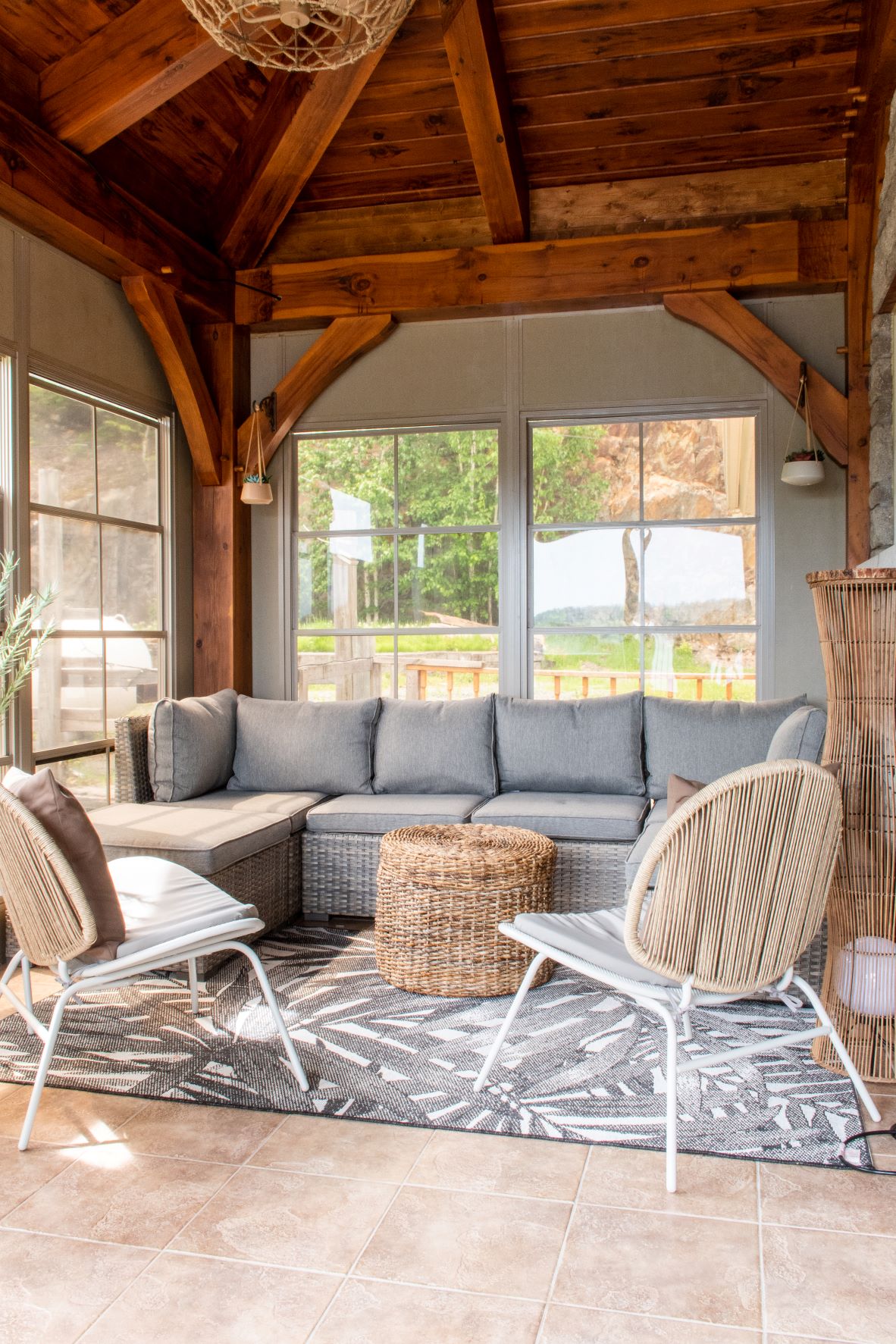 screened-in porch with seating