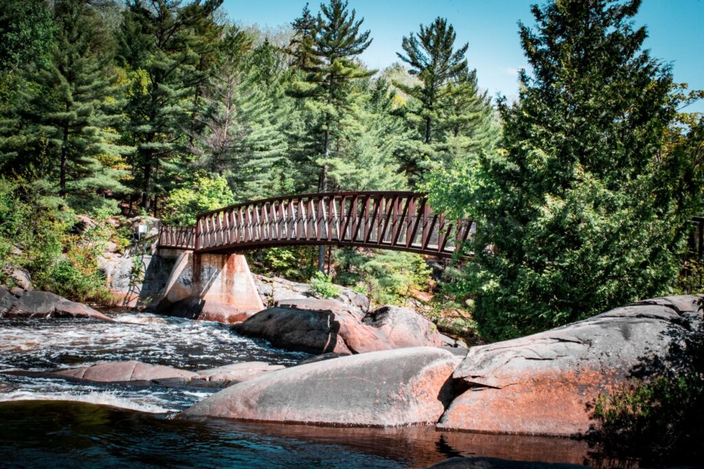 bridge with rocks at park while on executive cottage rentals ontario