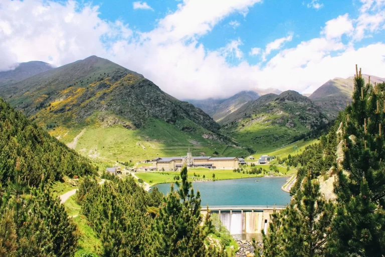 lake and mountains in vall de nuria on a day trip to Pyrenees from Barcelona
