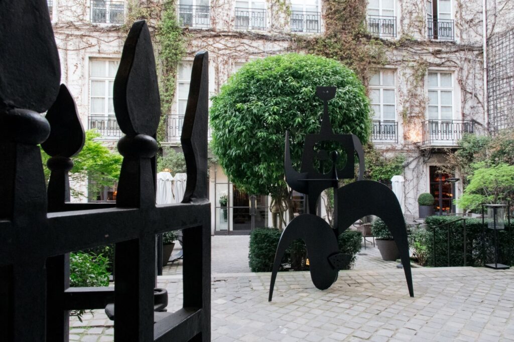 sculpture in courtyard at pavillon de la reine