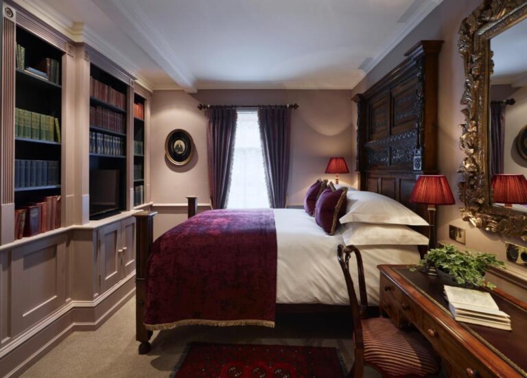king sized bed with library of books