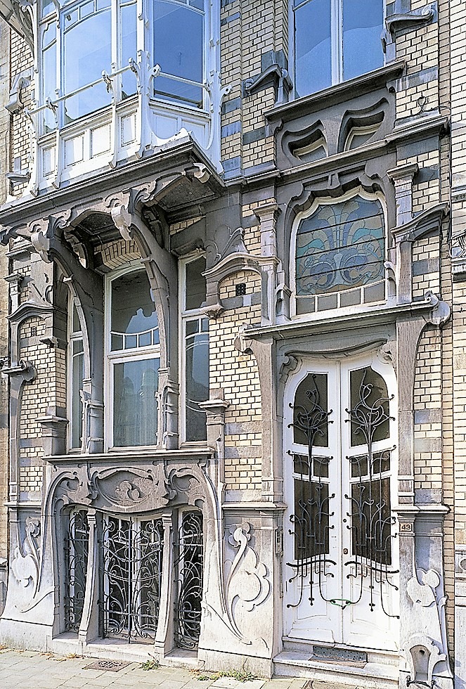 rounded doors and windows white door on art nouveau brussels house